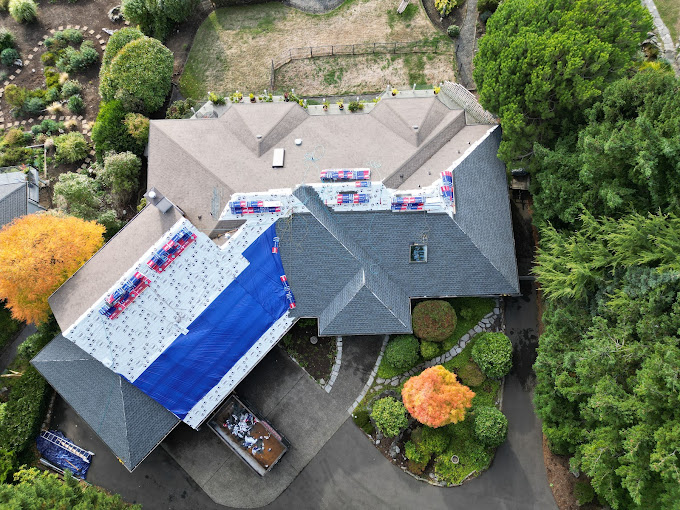 Certified roofing contractor working on a roof in Bellingham