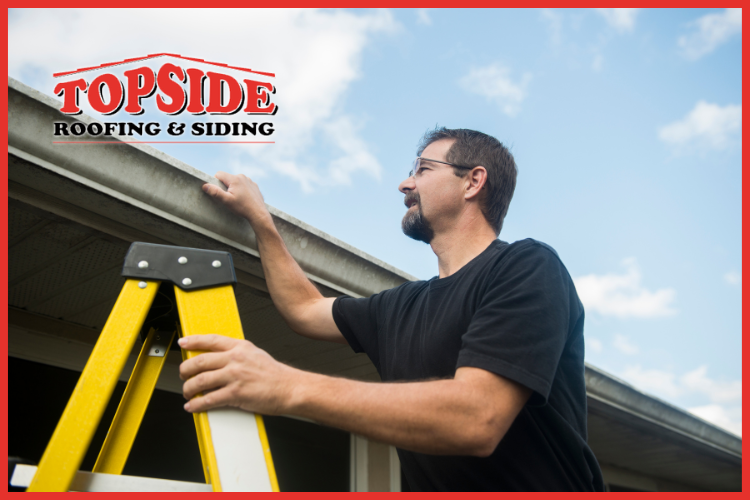 Homeowner performing a DIY roof inspection in Lynden, WA.