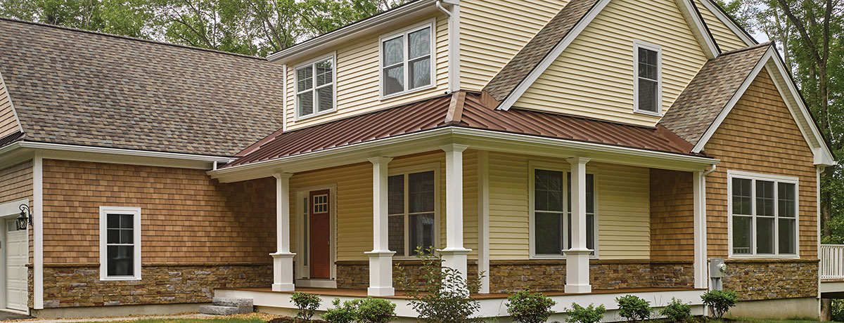 house with northwoods vinyl shake siding