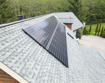 Solar panels installed on a residential roof in Deming, WA, by Topside Roofing & Siding